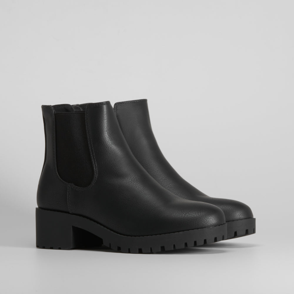 Botín chelsea basic track negro NYC