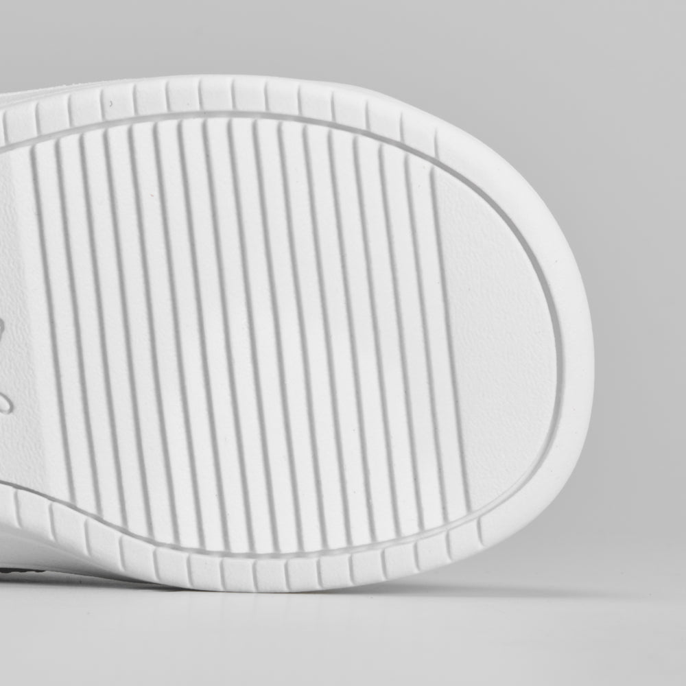 Deportiva bebé Rickie blanco negro PUMA
