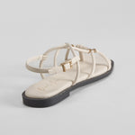 Sandalia plana tubular beige PICCOLA PIU