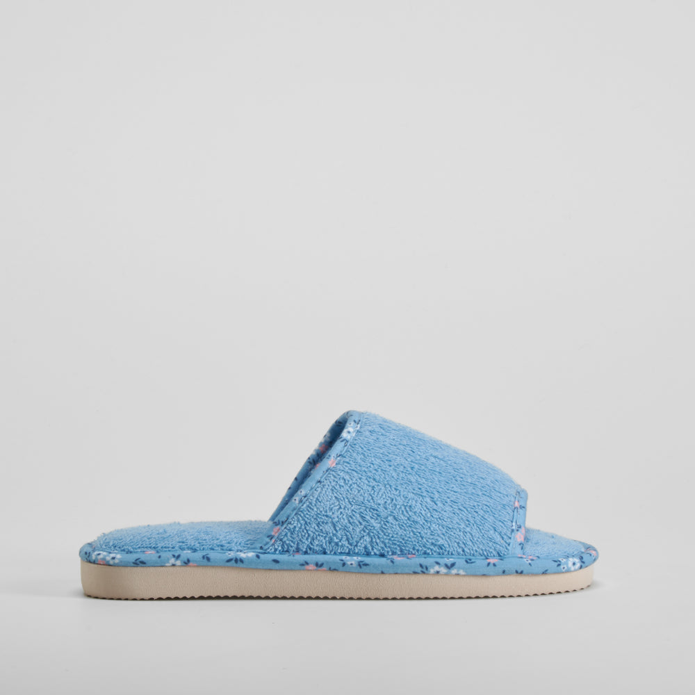 Zapatilla casa rizo ribete flores azul OLYNE