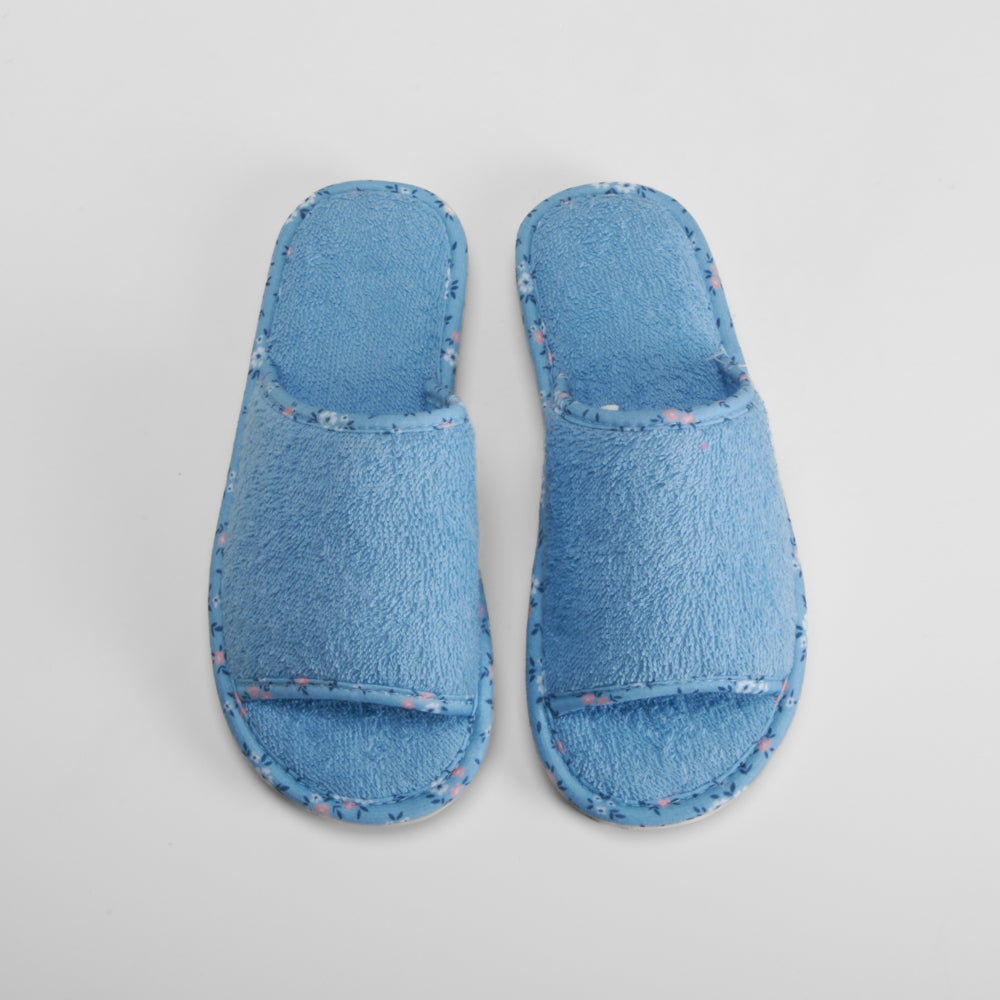 Zapatilla casa rizo ribete flores azul OLYNE