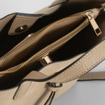 Bolso de mano tachuelas beige PICCOLA PIU