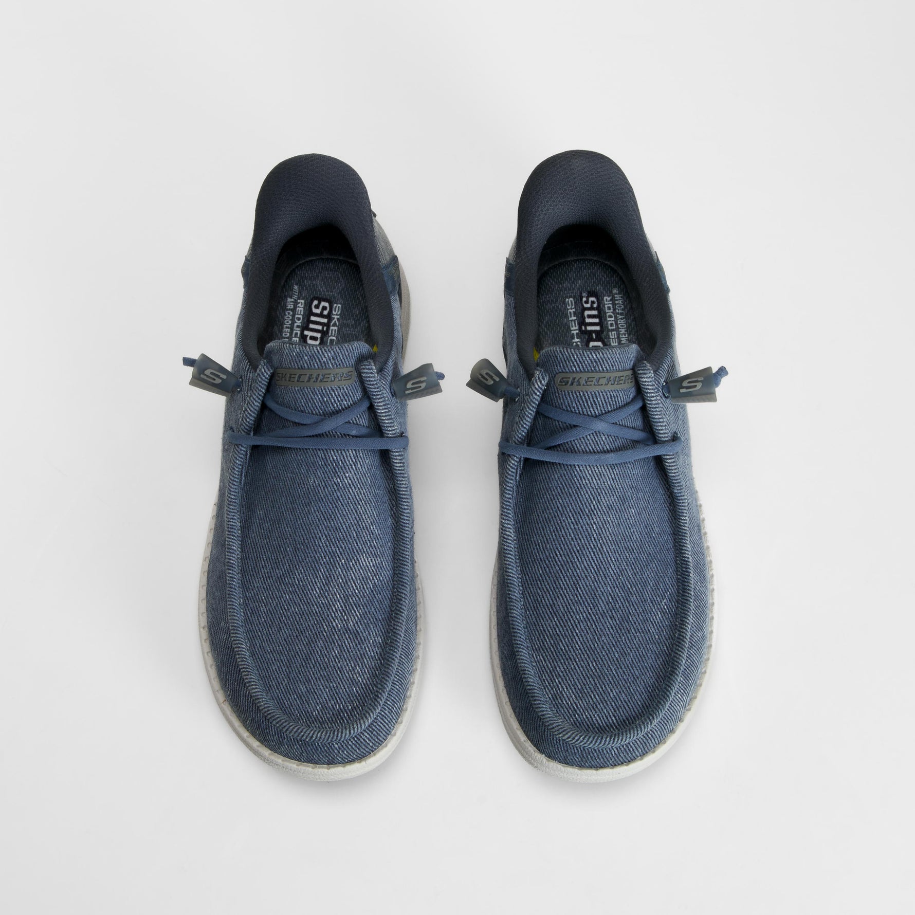 Zapatilla lona casual slip in azul SKECHERS