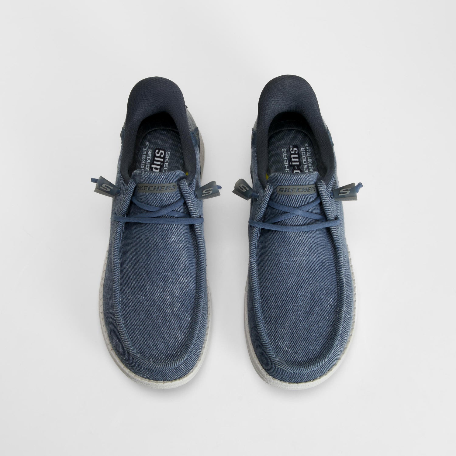 Zapatilla lona casual slip in azul SKECHERS