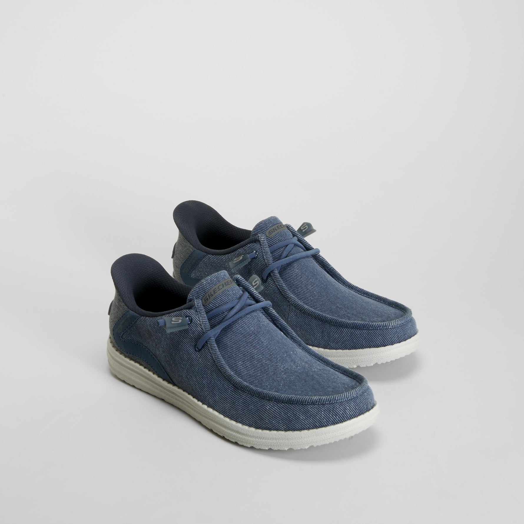 Zapatilla lona casual slip in azul SKECHERS