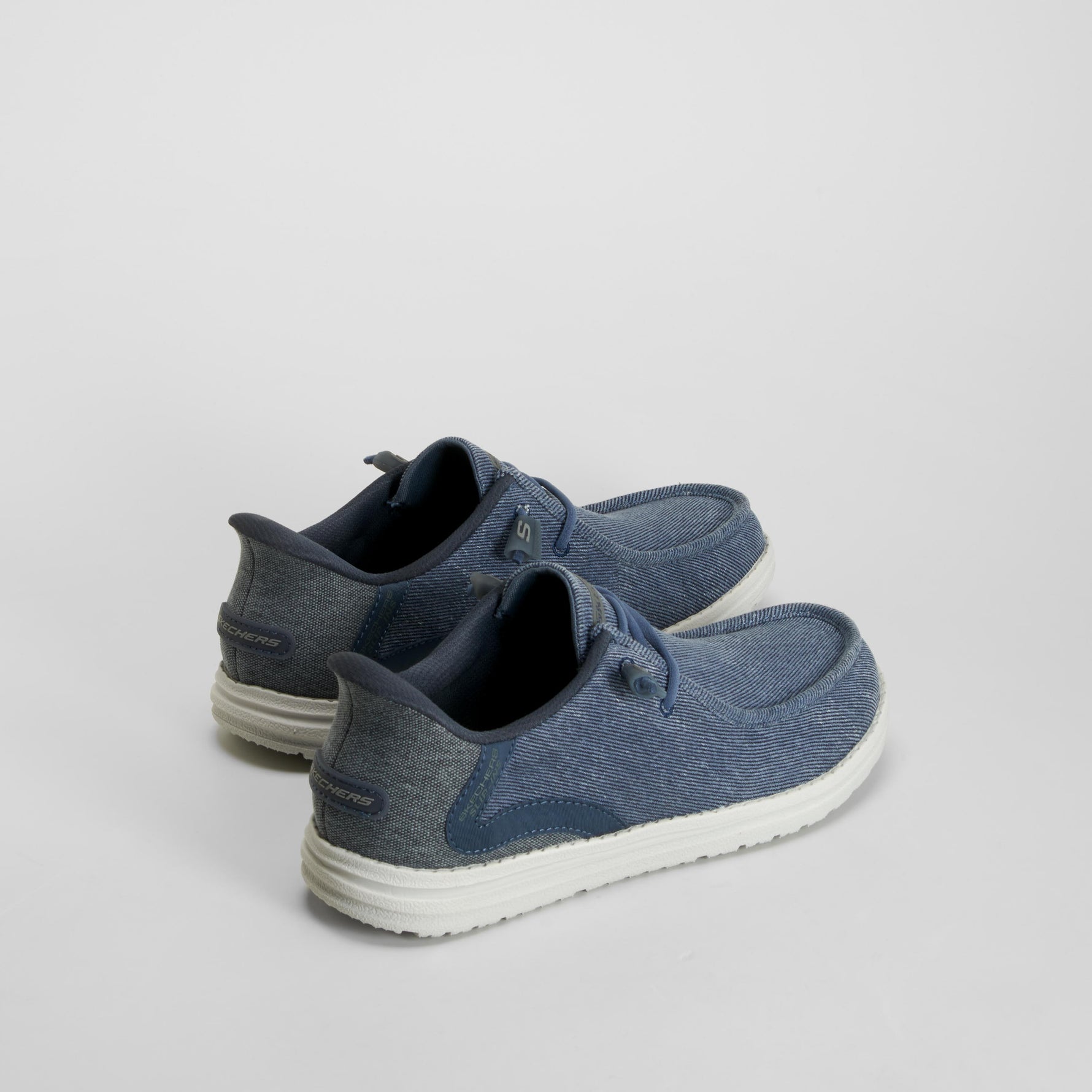 Zapatilla lona casual slip in azul SKECHERS