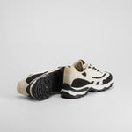 Zapatilla deportiva blanca y negra NYC