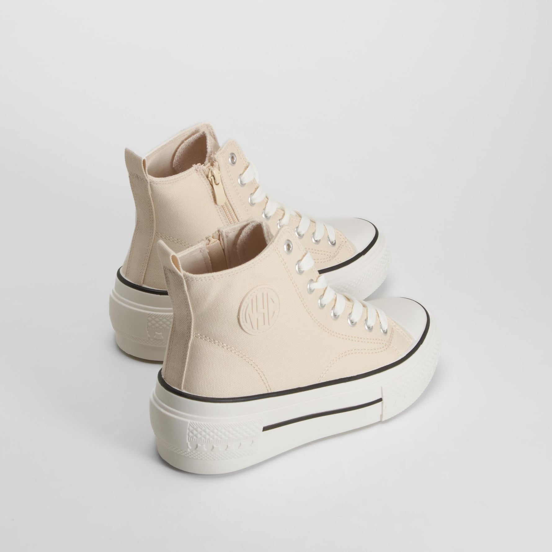 Zapatilla alta de lona cuña beige NYC