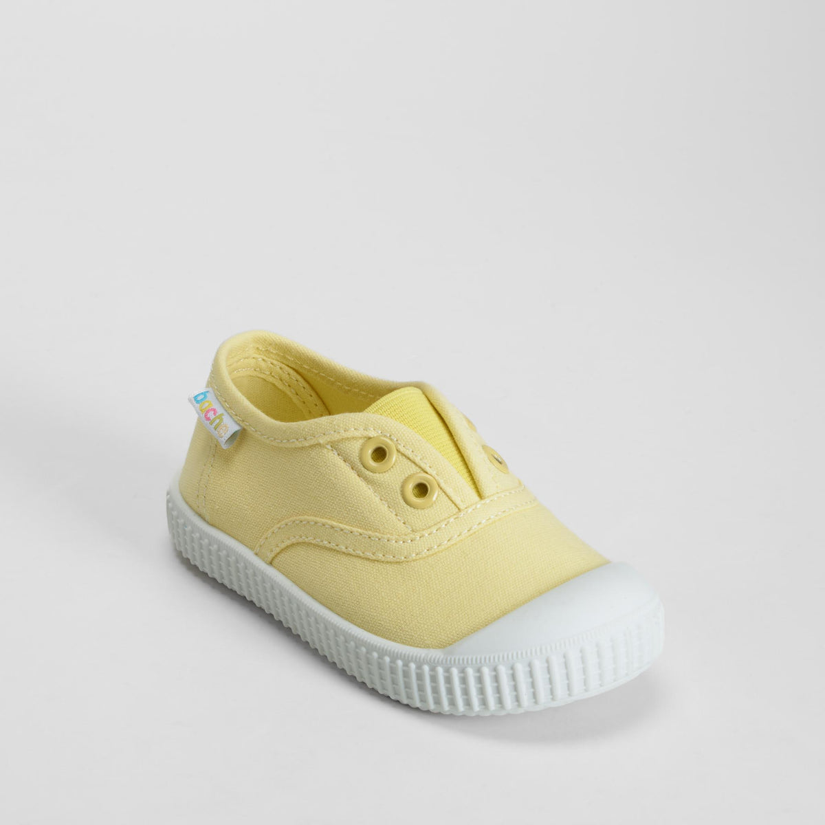 Zapatilla lona puntera bebé amarillo BACHE