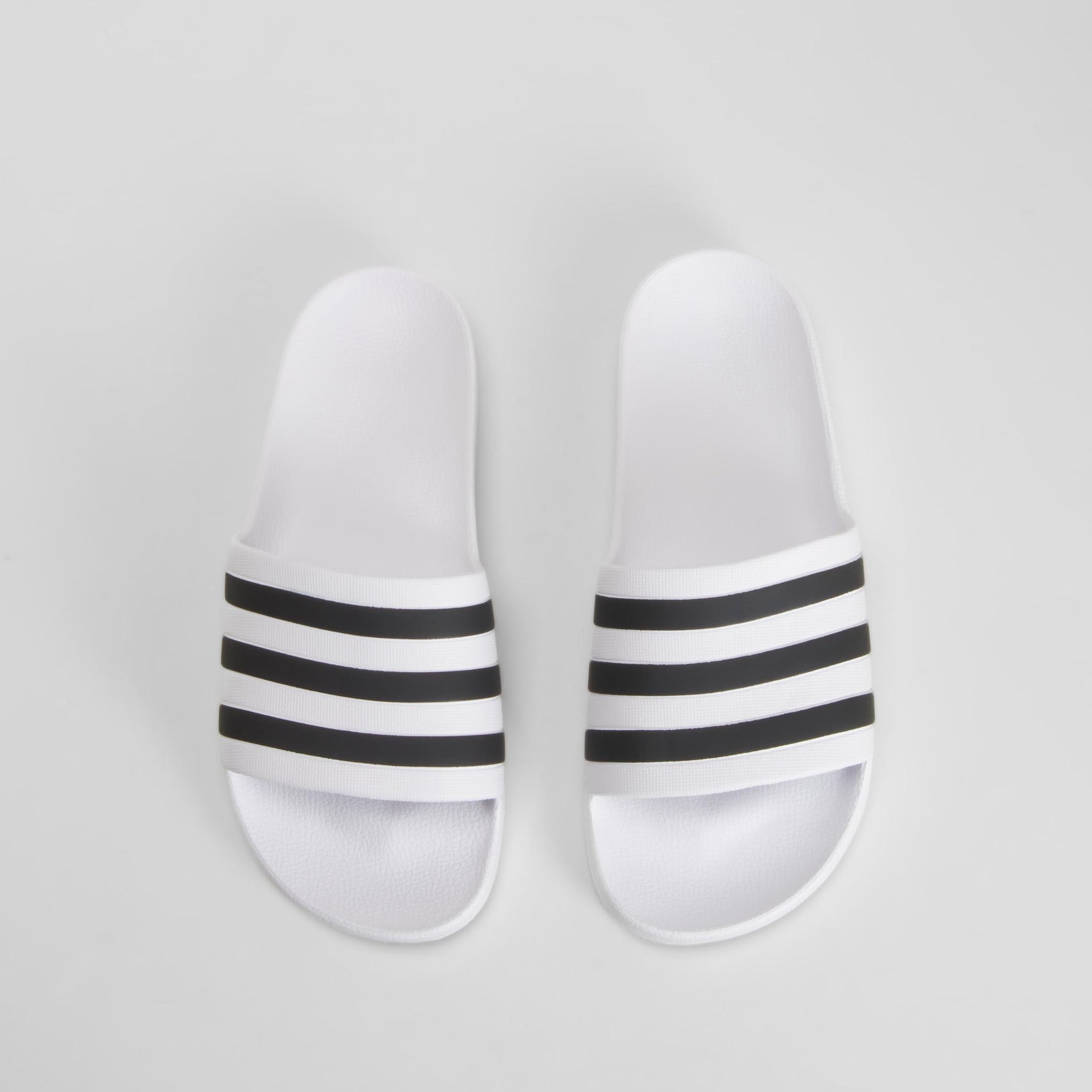 Chancla piscina man blanca línias negras ADIDAS