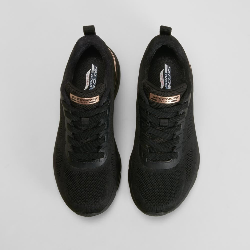 Zapatilla deportiva detalles negra SKECHERS