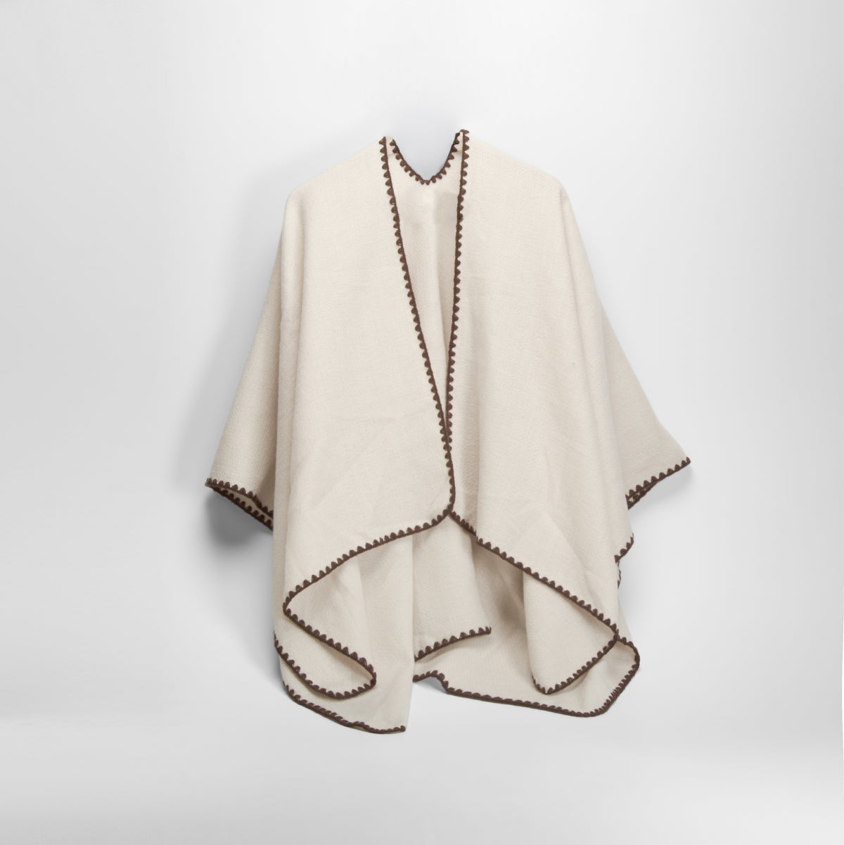 Poncho ribete contraste color beige PICCOLA PIU