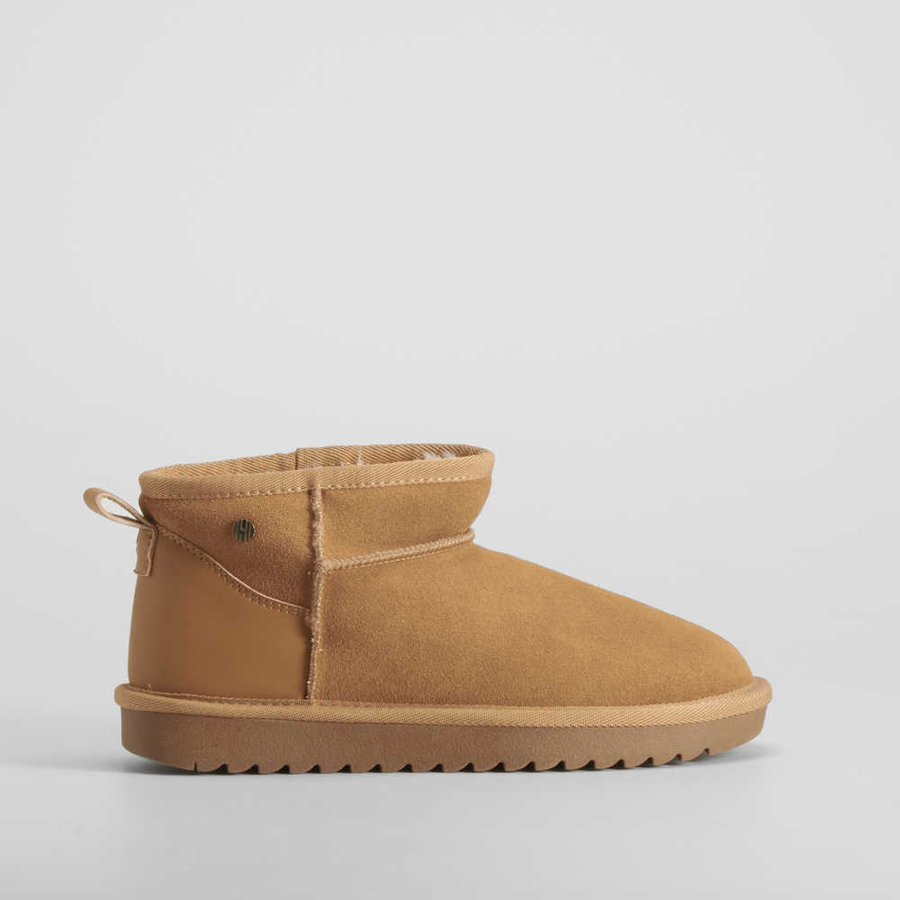 Botín pelo piel beige NYC - Talla: 41